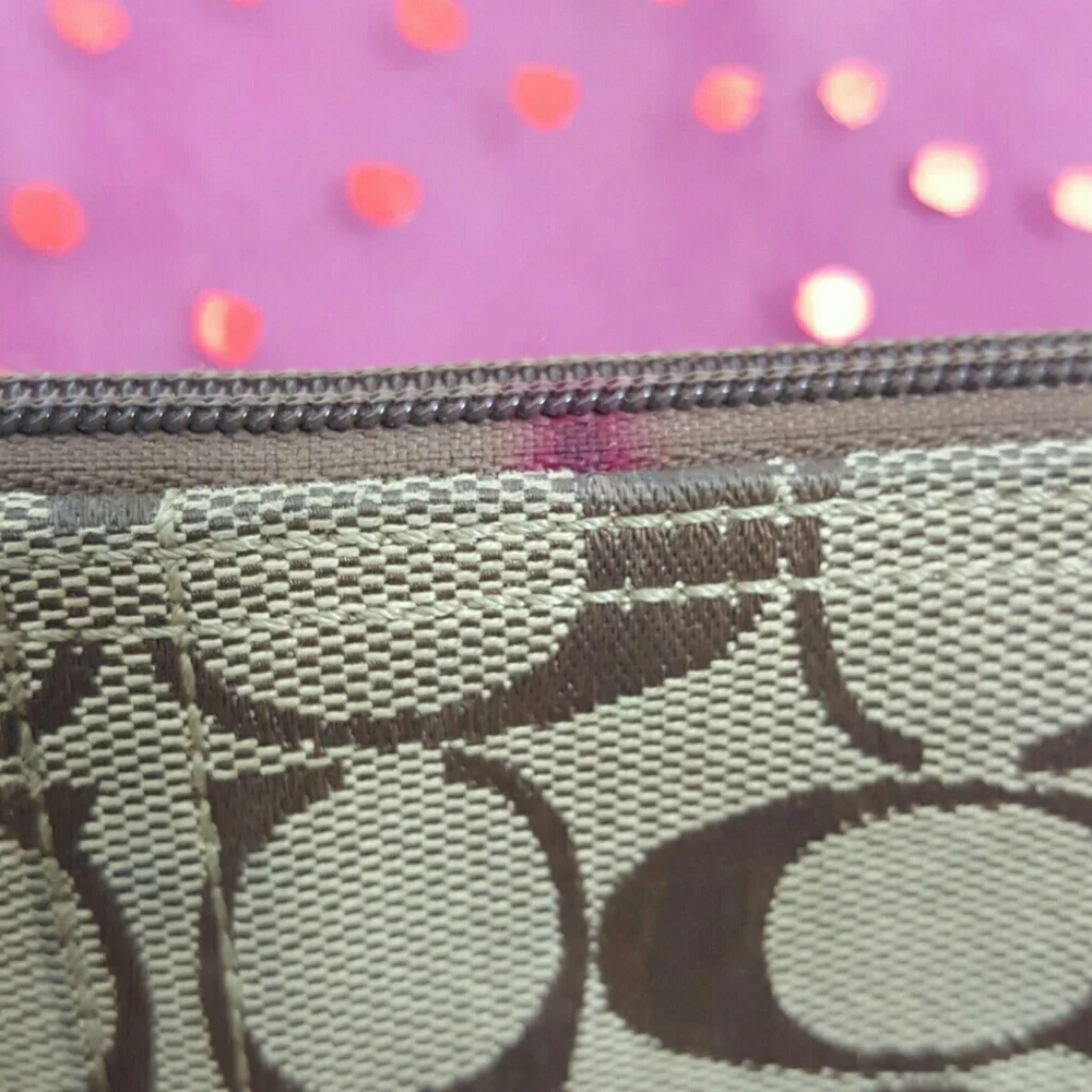 Coach brown canvas wristlet